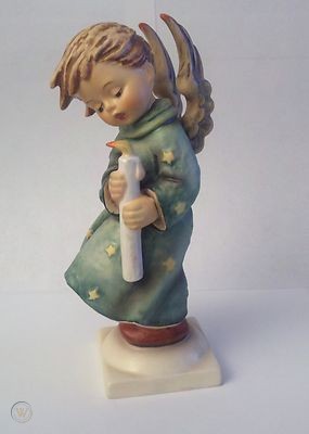 Hummel angel boy holding candle.